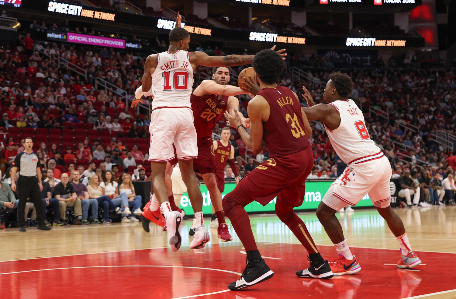 Cavaliers forward Georges Niang (20) has his pass intercepted by Houston Rockets forward Jae'Sean Tate (8) in the fourth quarter at Toyota Center.